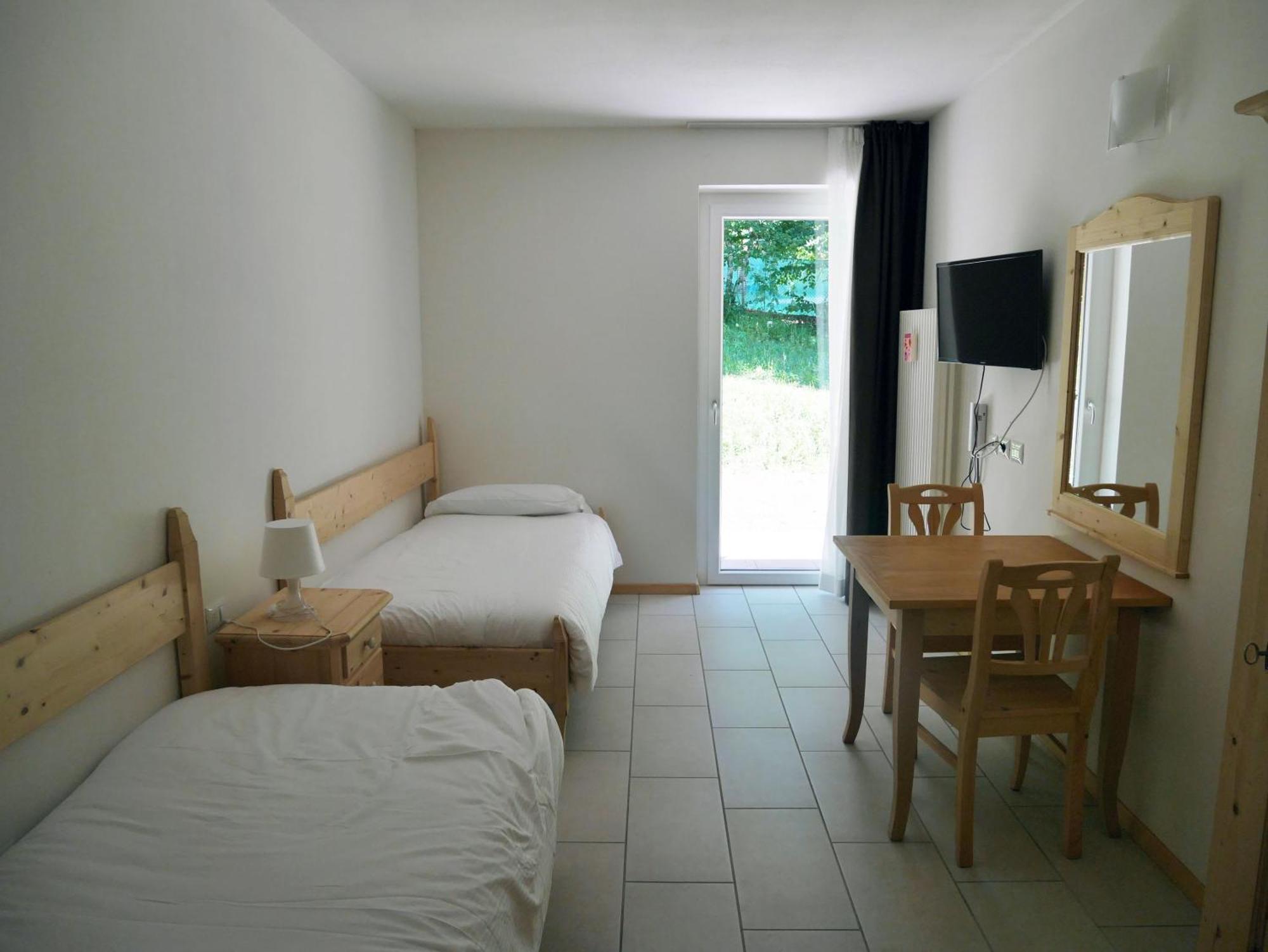 Hotel Elbele Garni Folgaria Quarto foto